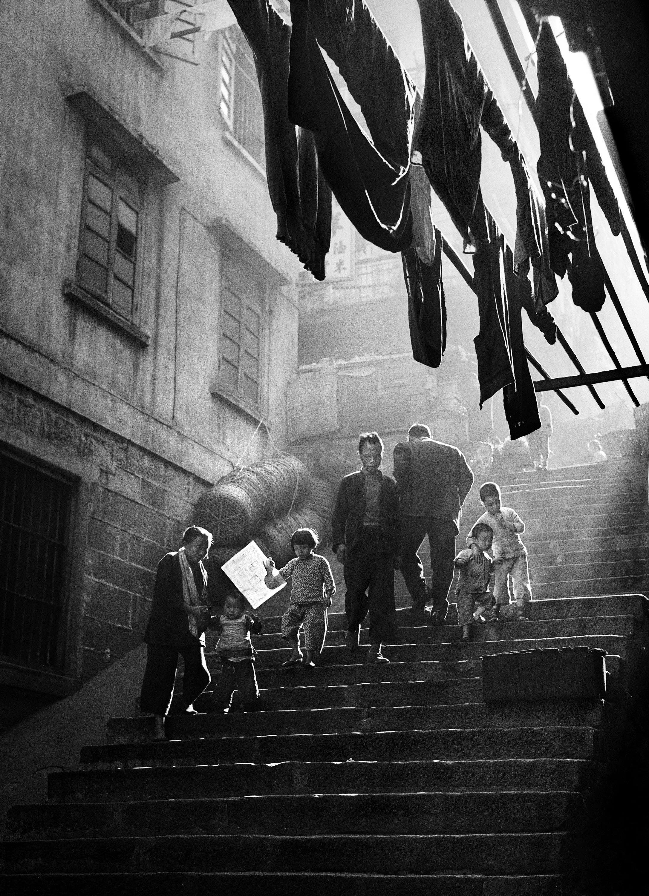 Fan Ho 何藩 'Street Scene (街景)', Hong Kong 1956, courtesy of Blue Lotus Gallery