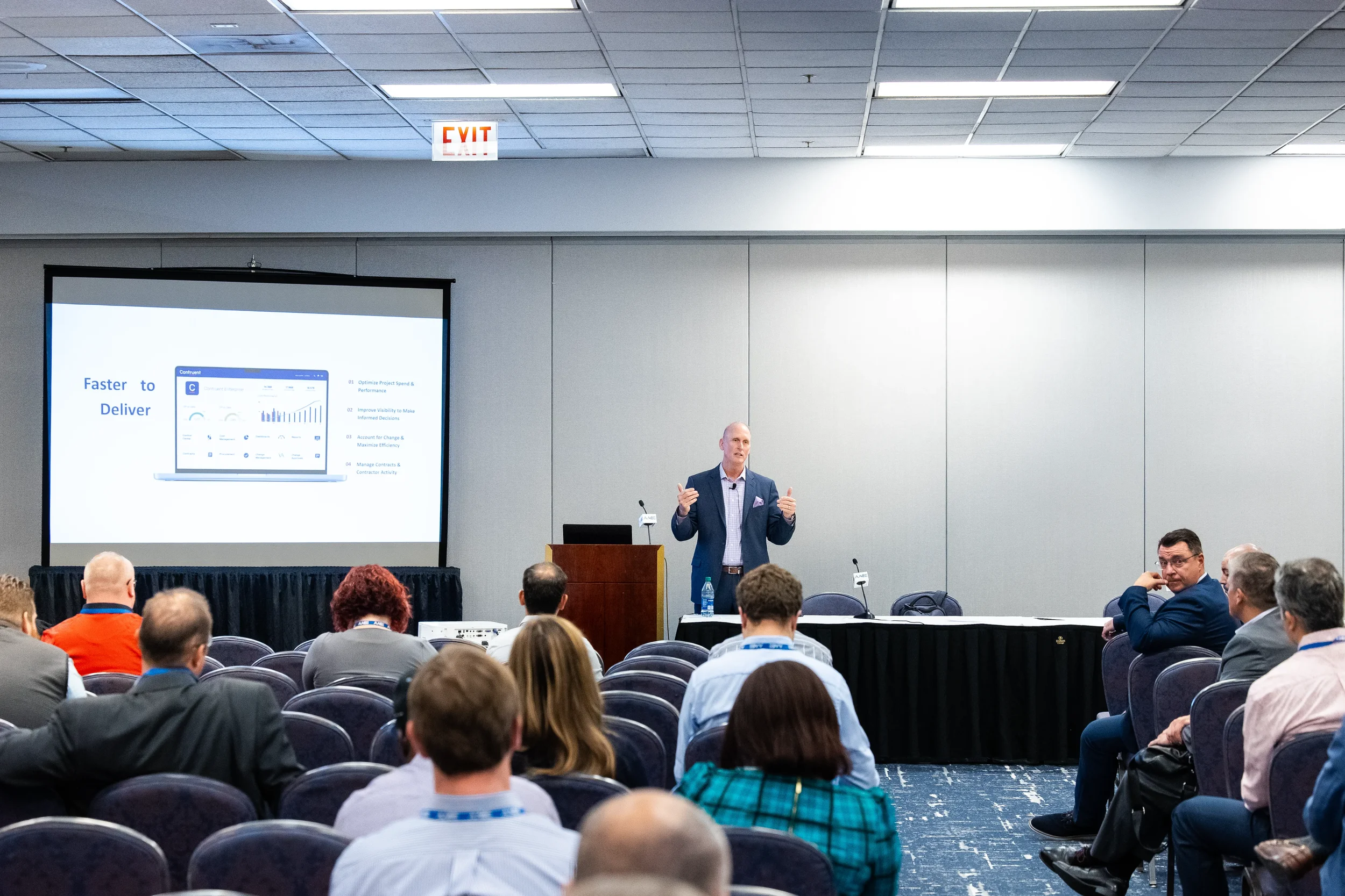 Speaker presents with slides during breakout session at Chicago conference