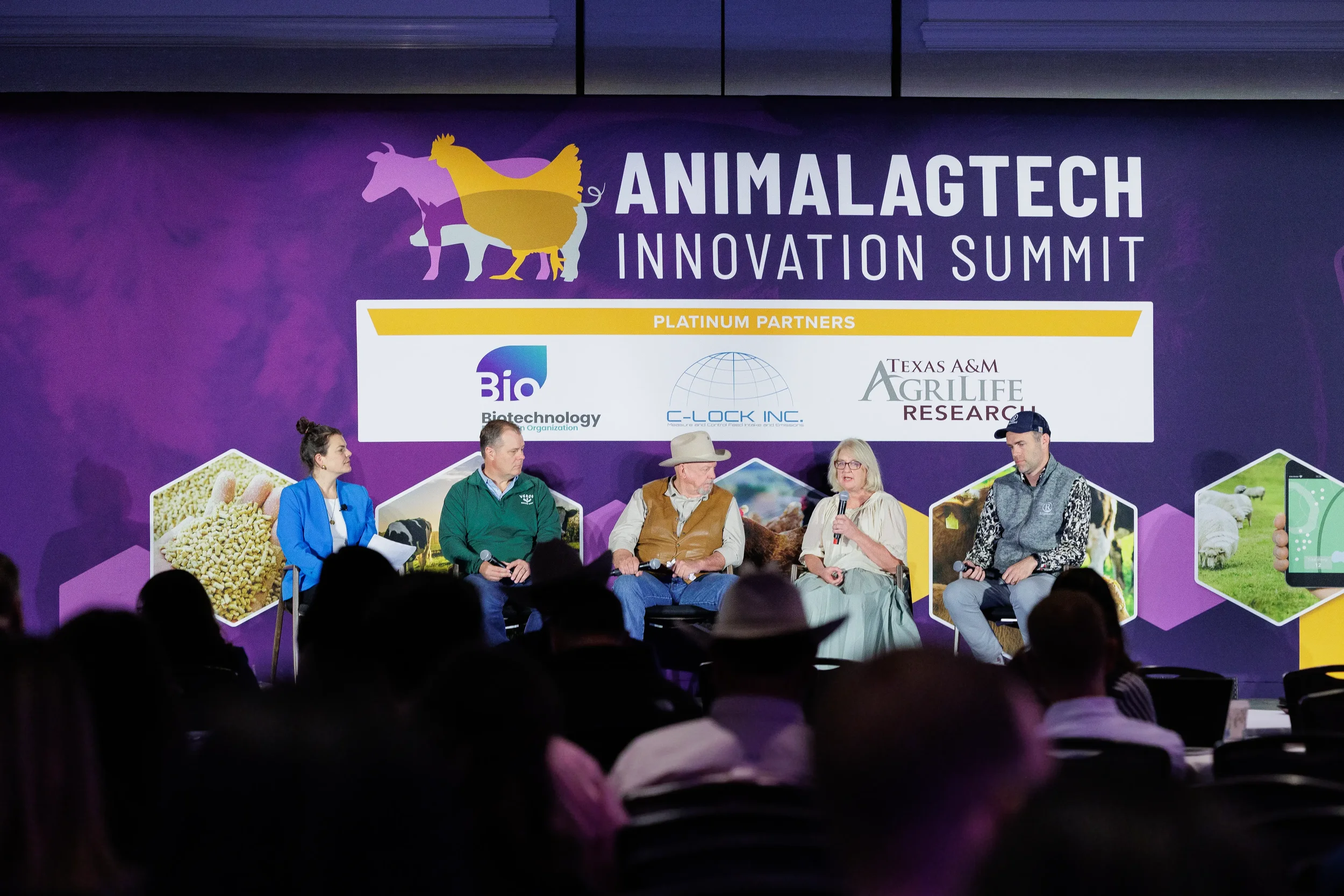 Five panelists discuss on branded stage during session at Chicago corporate summit