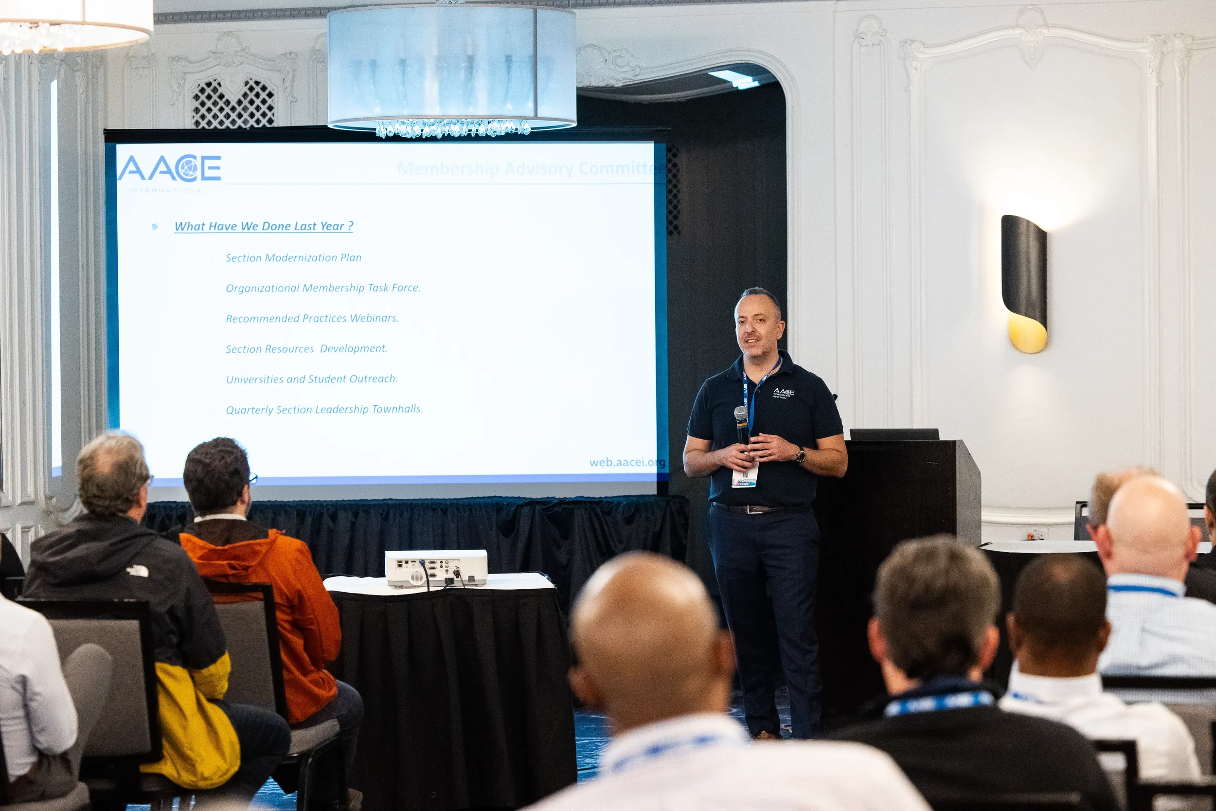 Speaker presents Membership Advisory Committee update to attendees at AACE International conference in Chicago