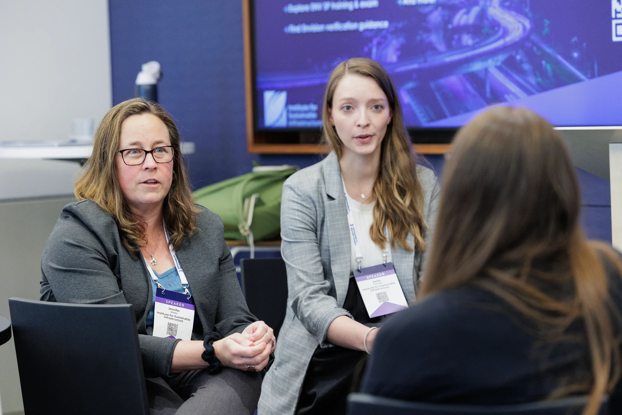 Two speakers seated together during a breakout panel discussion at Chicago industry conference