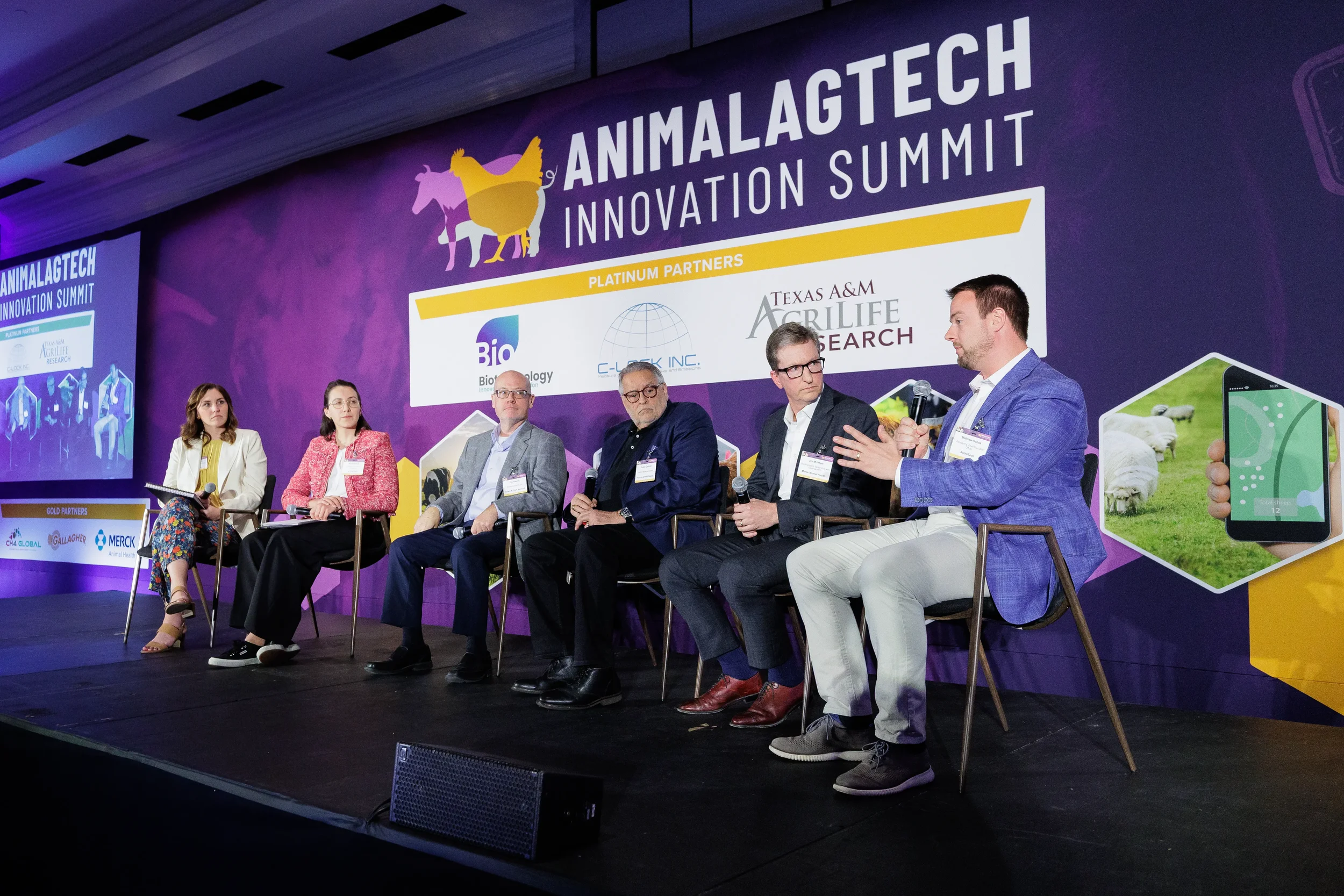 Six panelists discuss on branded stage during session at Chicago industry summit