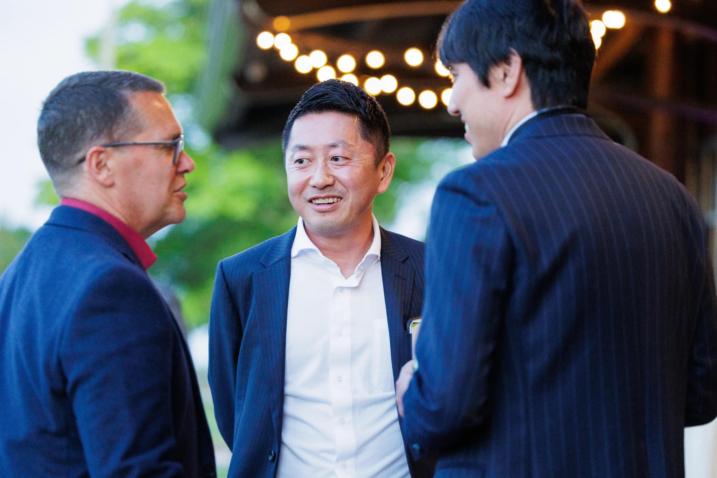 Attendees converse during evening reception at Orlando corporate event