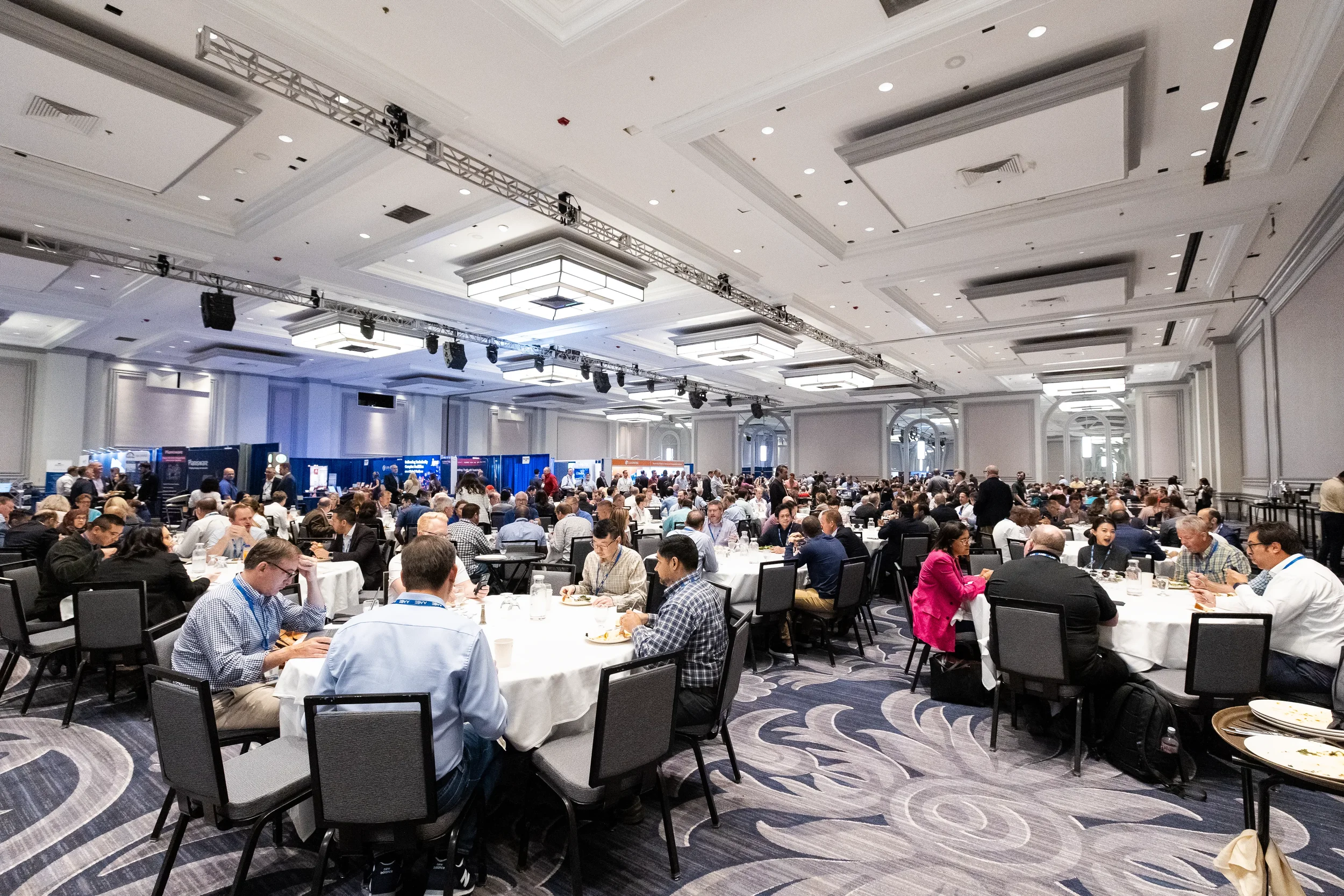 Wide view of conference luncheon with hundreds of attendees at AACE International 2024 in Chicago