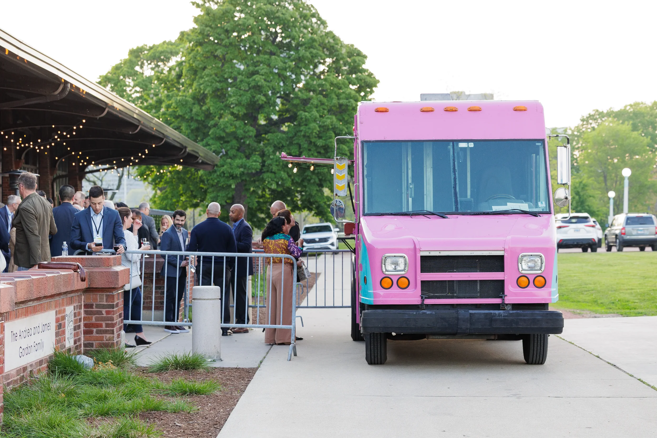 Food truck serves attendees during outdoor evening reception at Orlando corporate event