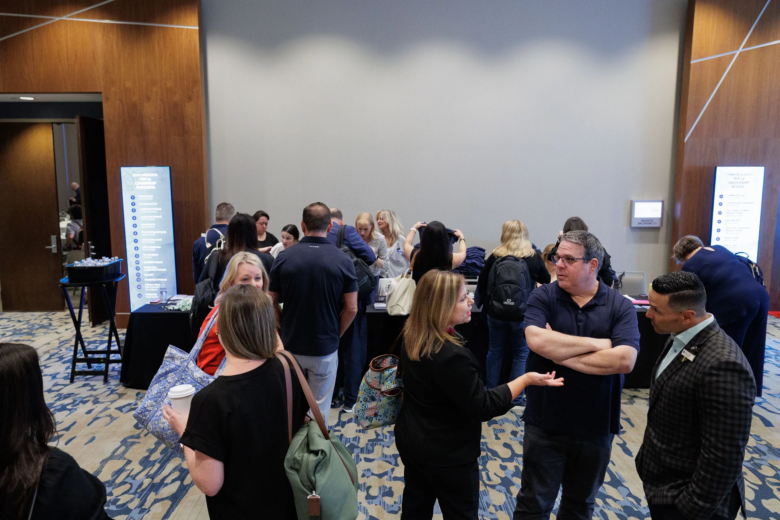 Attendees gather at registration area and network during Chicago corporate conference arrival