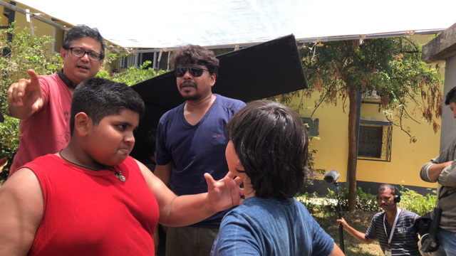 Scene 18 Shot 1: CU Pappu as he wrestles