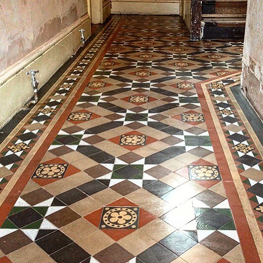 Are beautiful Victorian tiles hidden below the carpet in your corridor? #victoriantiles #architecture #thefloorrestorers