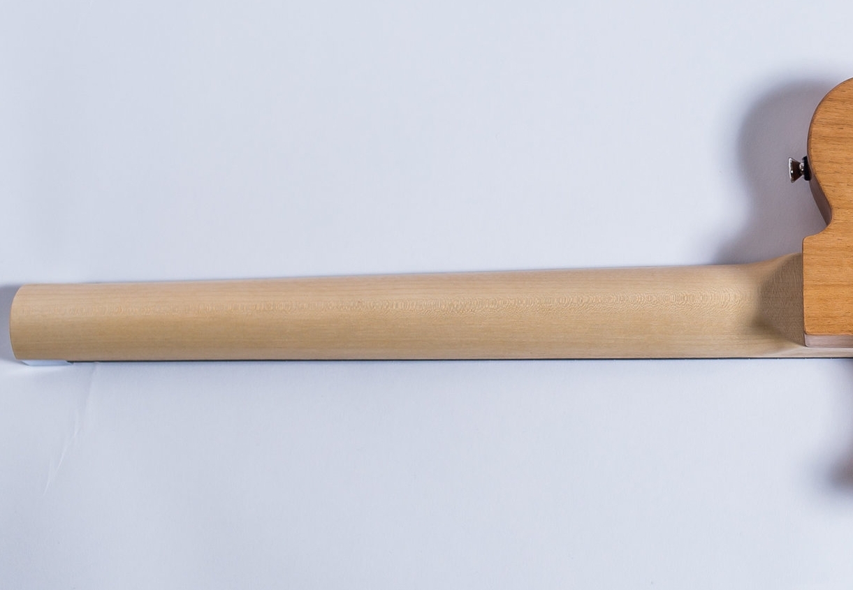 American quarter-sawn maple for the neck shaft to provide maximum stability thus enhancing the instrument’s resonance.