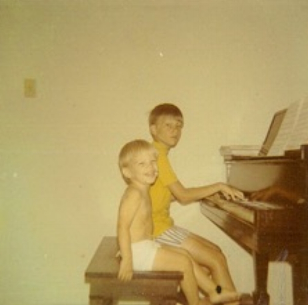 OBSESSED FROM AN EARLY AGE I, too, was obsessed with music as a child. My mother’s Hi-Fi was a gift from her parents in 1957 and was pricey so it was a Christmas and 16th Birthday gift. According to my mother, “It was a piece of furniture.” As a child, my mother listened to a lot of jazz; Stan Kenton, Billie Holiday, Dave Brubeck, Erroll Garner. She played the piano and hummed off key. My brother Cade always loved to get in on the act.