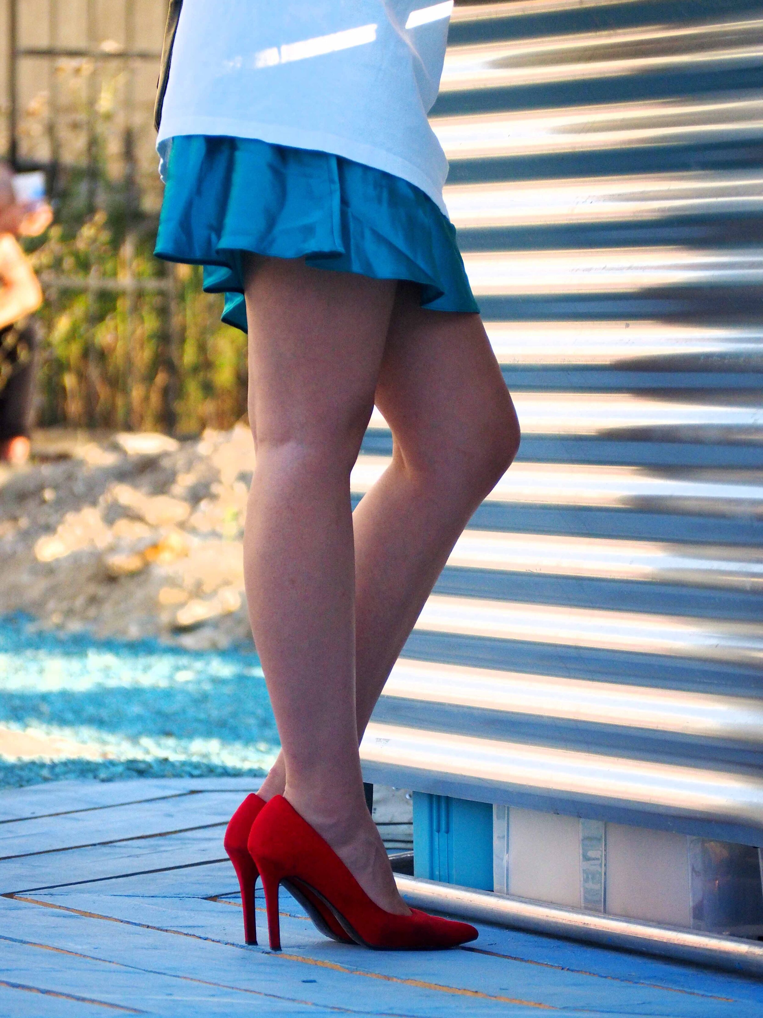 Blue skirt and red shoes