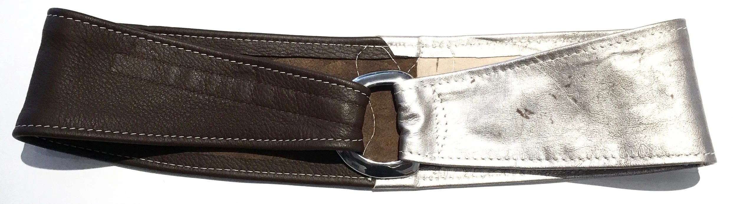 Brown deerskin and silver metallic lambkin HipWear. Polished nickel D ring and adjustable velcro closure. $248..jpg