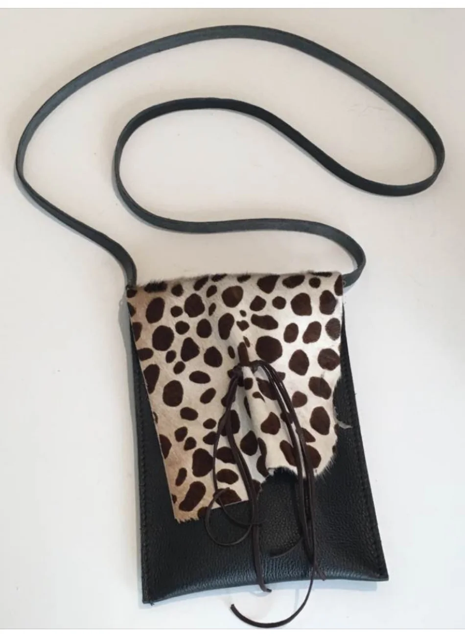 cheeta purse.jpeg