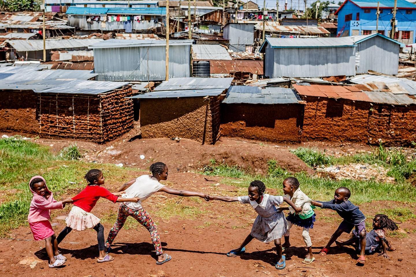 Along the Motione River in Kibera &mdash; a neighborhood in Nairobi &mdash; the riverbank where children used to play has been heavily polluted. The soil along the riverbank is often dug up by residents and used to build houses in the area. Right: No