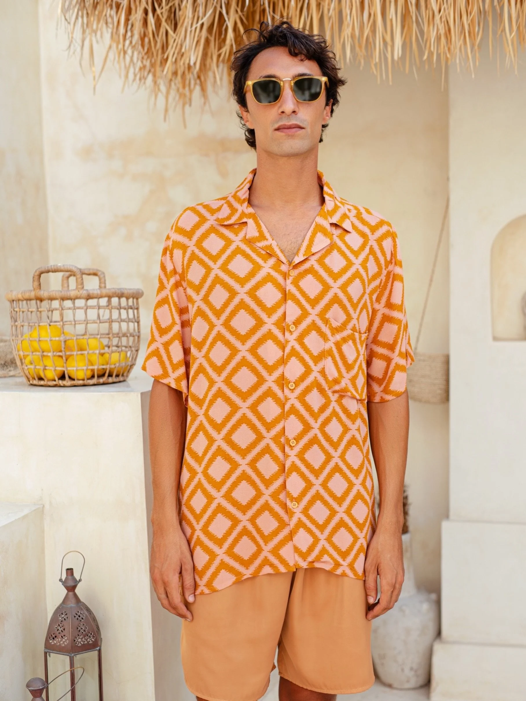 Mahana - a celebration of summer in warm orange and salmon hues.

Inspired by sun-drenched coastlines and endless days outdoors, it&rsquo;s the kind of shirt you&rsquo;ll reach for on every adventure. 
Light, vibrant, and effortlessly relaxed, Mahana
