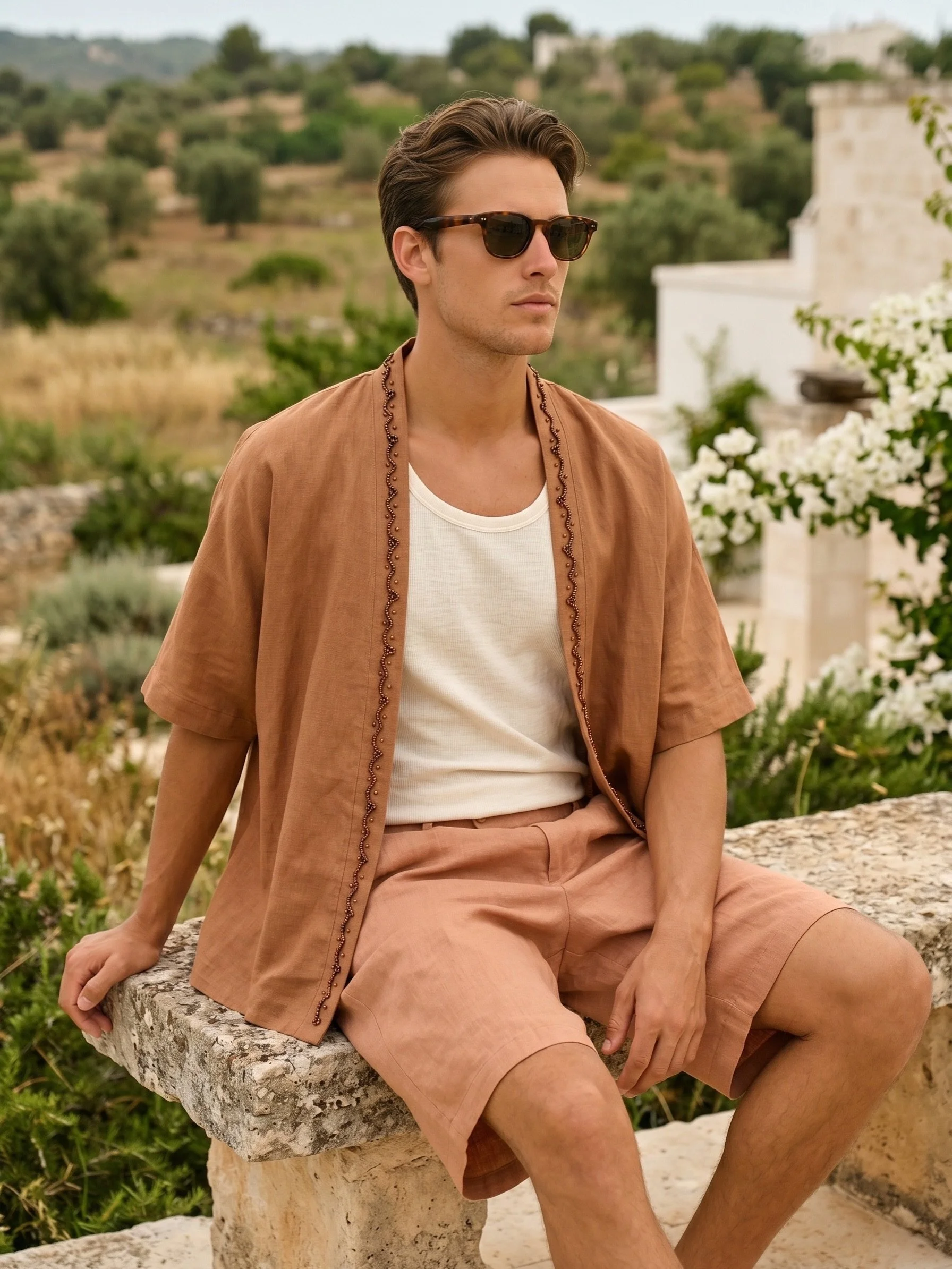 Dune &mdash; our hand-embroidered linen kimono created in collaboration with @shaman_ibiza inspired by the grounding beauty of earthy terracottas, sun-faded pastels, and the soulful ease of summer in Ibiza. Crafted with exquisite handwork and designe