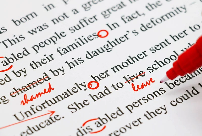 A page of a novel with proofreaders marks showing the document has been expertly proofread