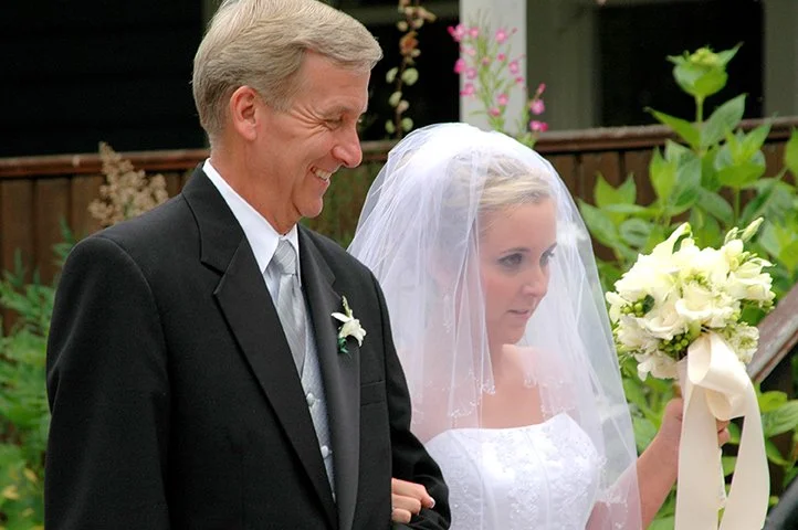 Father who has given a heartfelt speech with is daughter on her wedding day