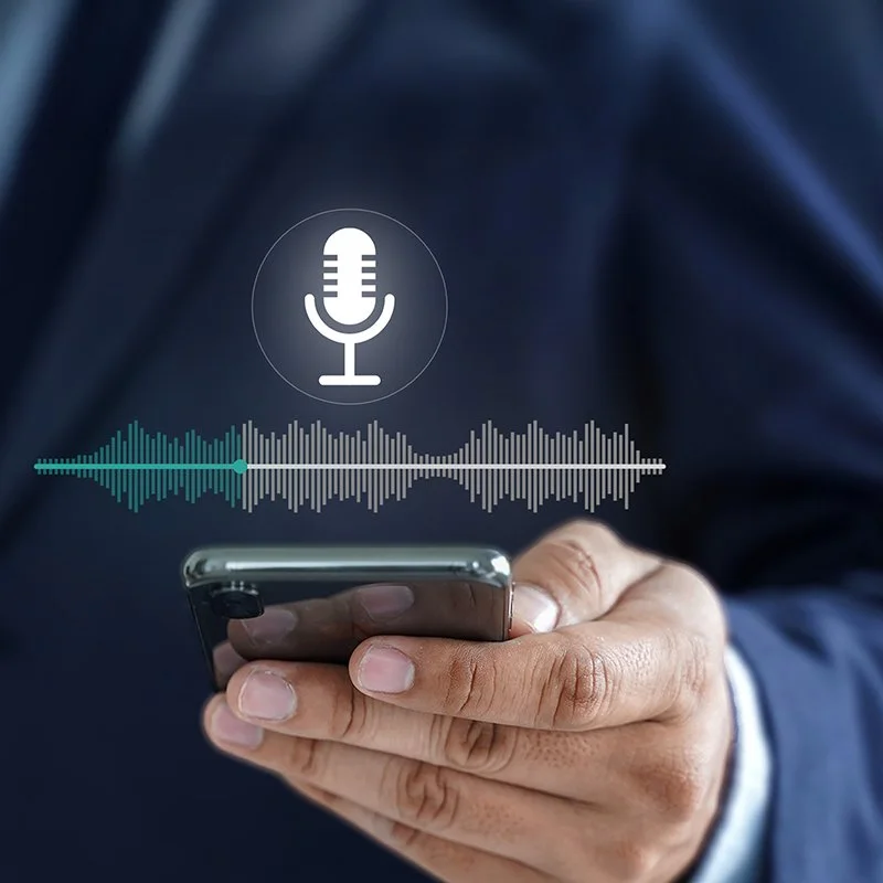 Man holding a phone to give a speech