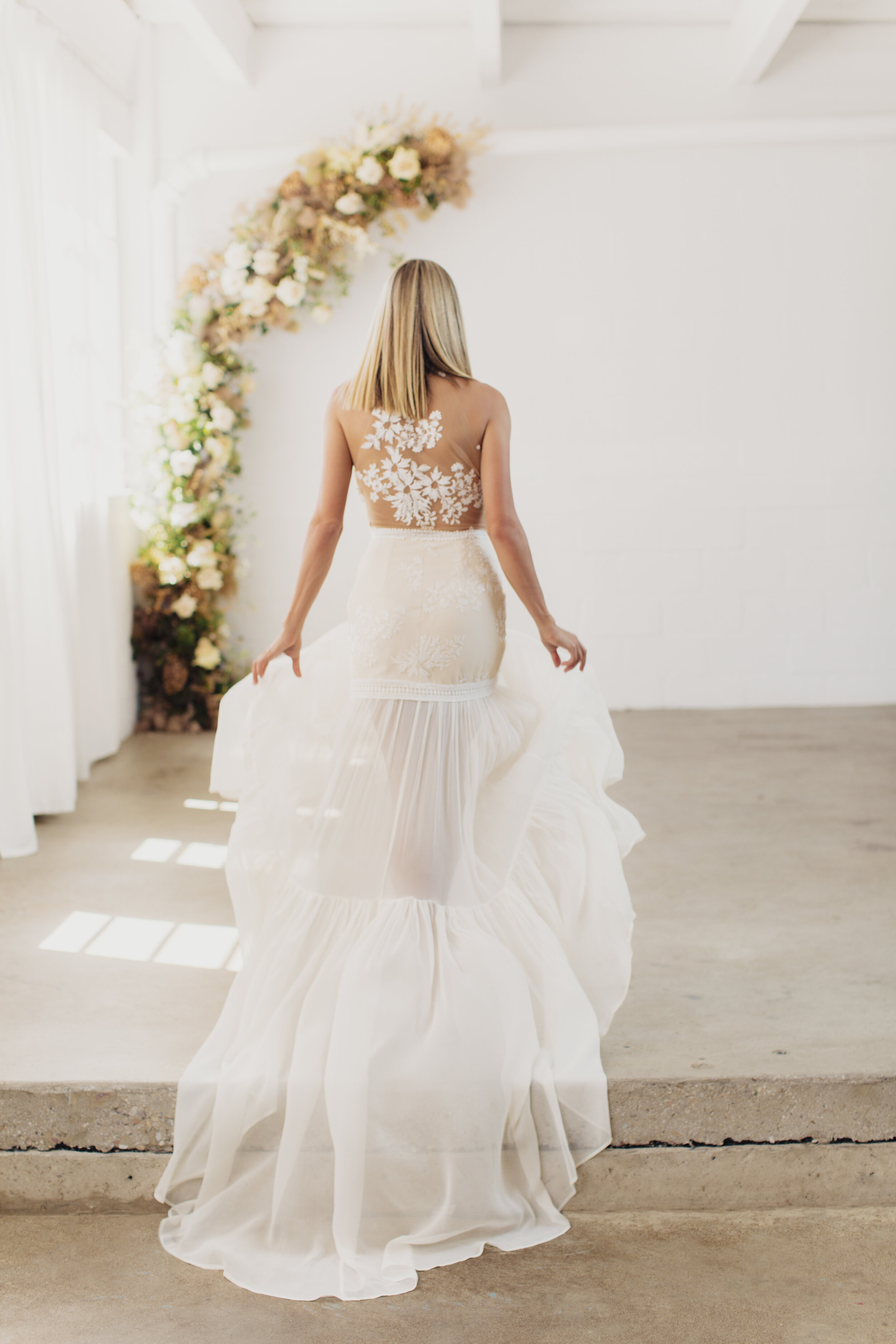 bride with chiffon train