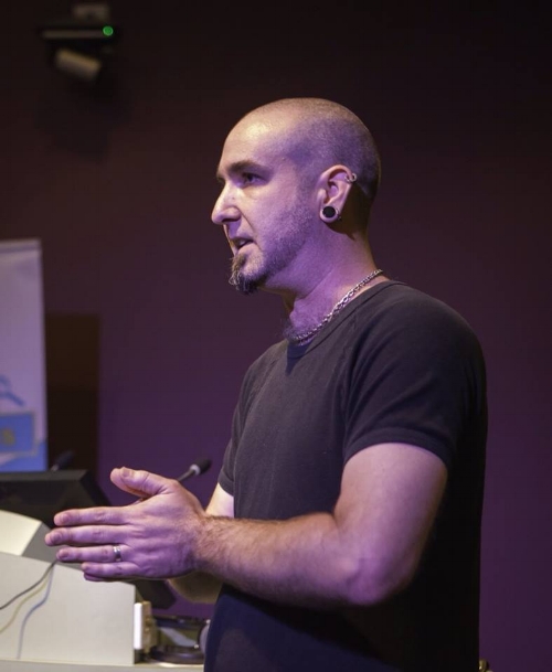 Description: Mike presenting at the Skeptic's Conference