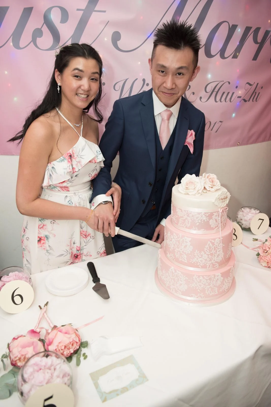 Weeta cutting Pink Cake.jpg