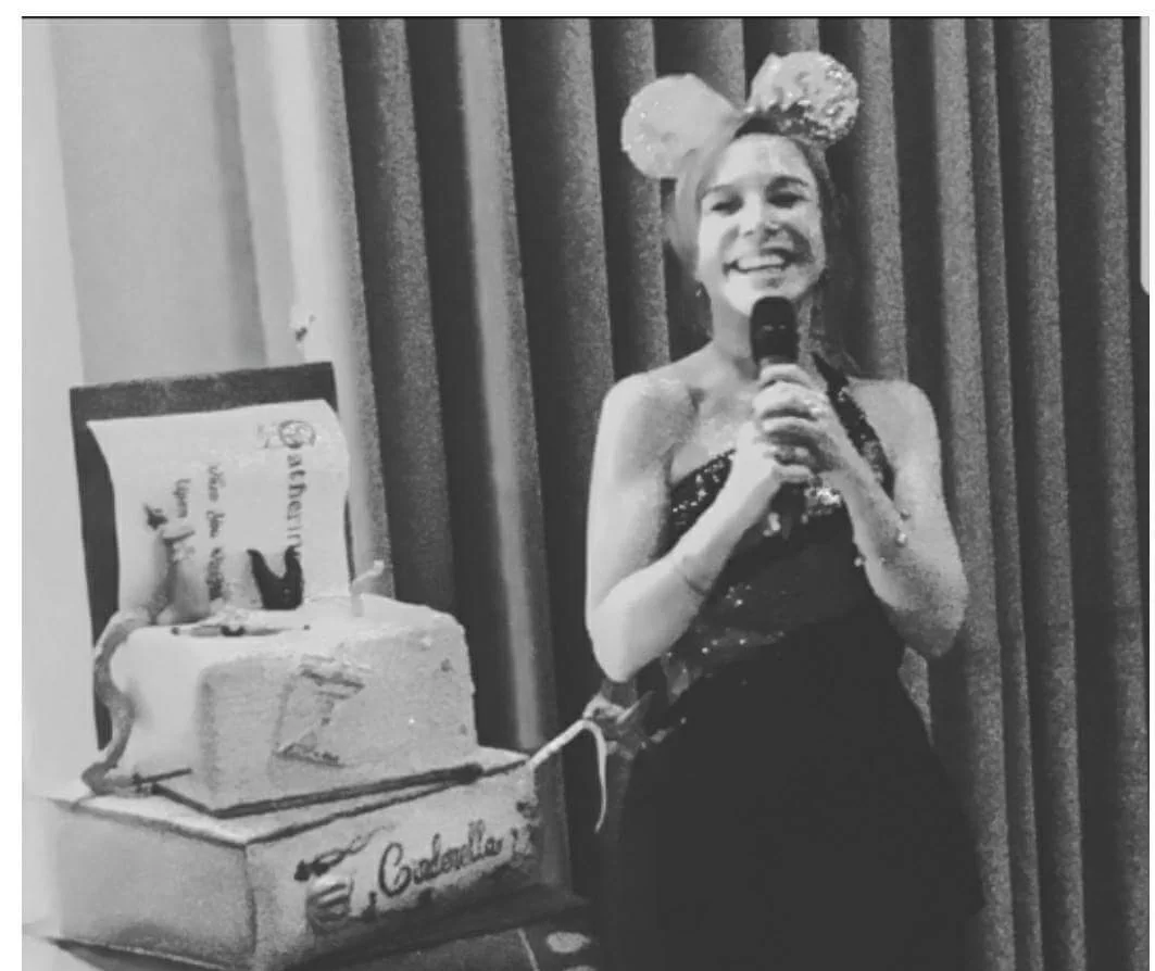 Catherine Powell with her cake.jpg