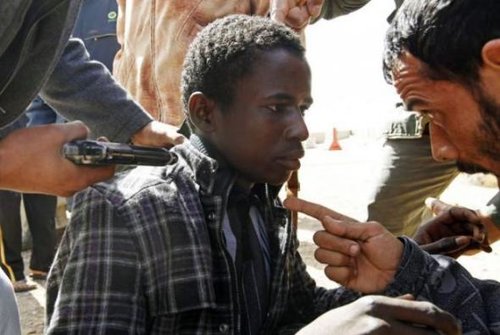 A young African on the conveyor belt to a mass grave, courtesy of Western media and politicians