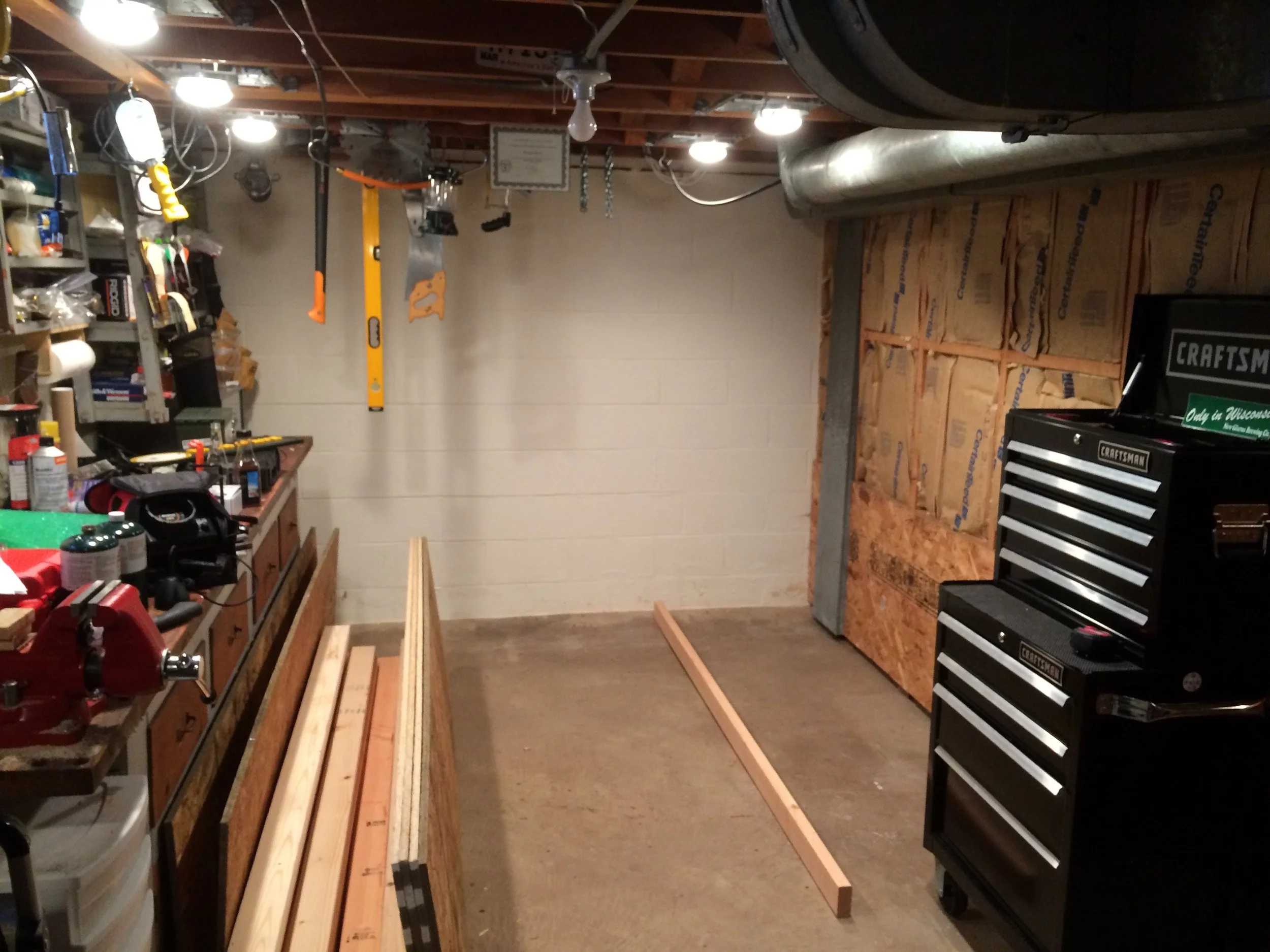 The corner I plan to build the shelves in the work area of our basement.
