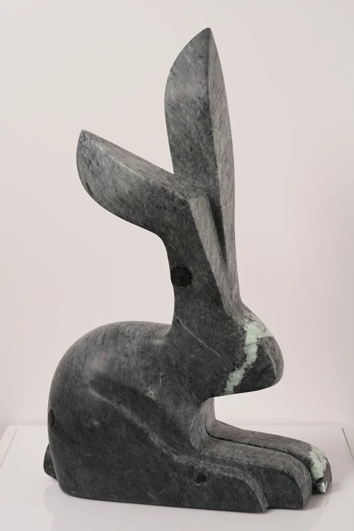 The Peculiar Resting Rabbit Rests Peculiarly