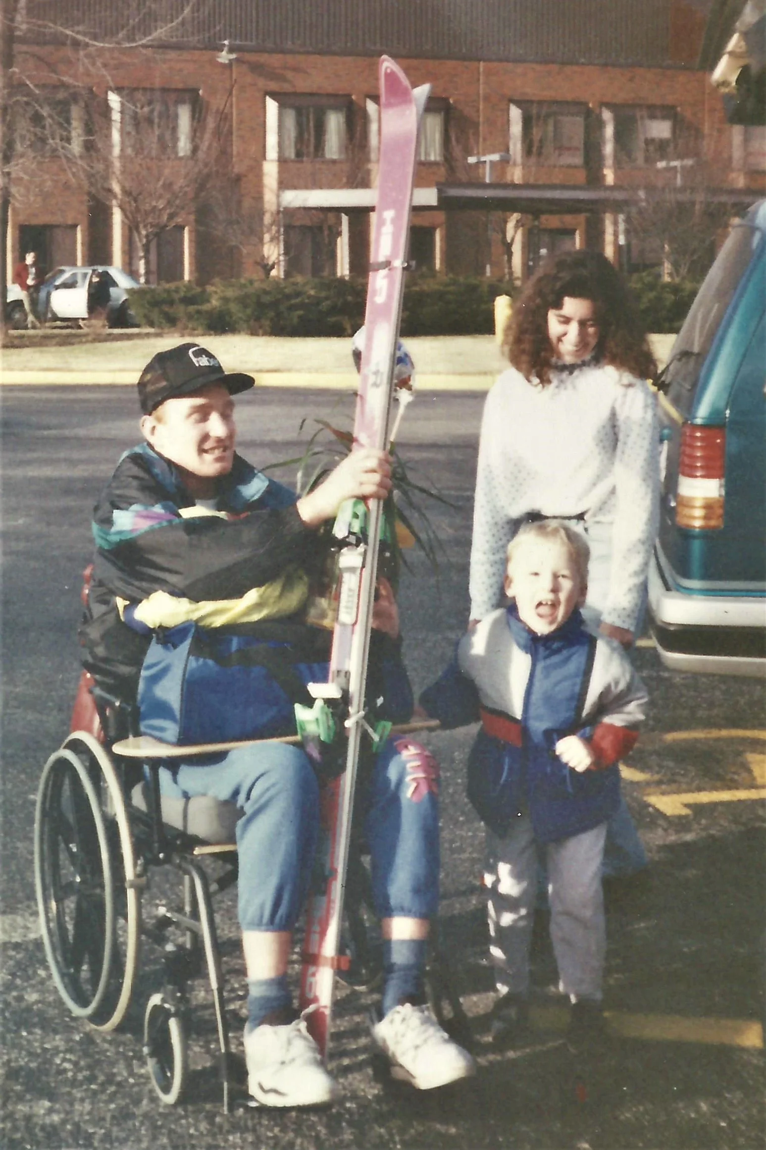 Bringing Ken and his skis home from the hospital.