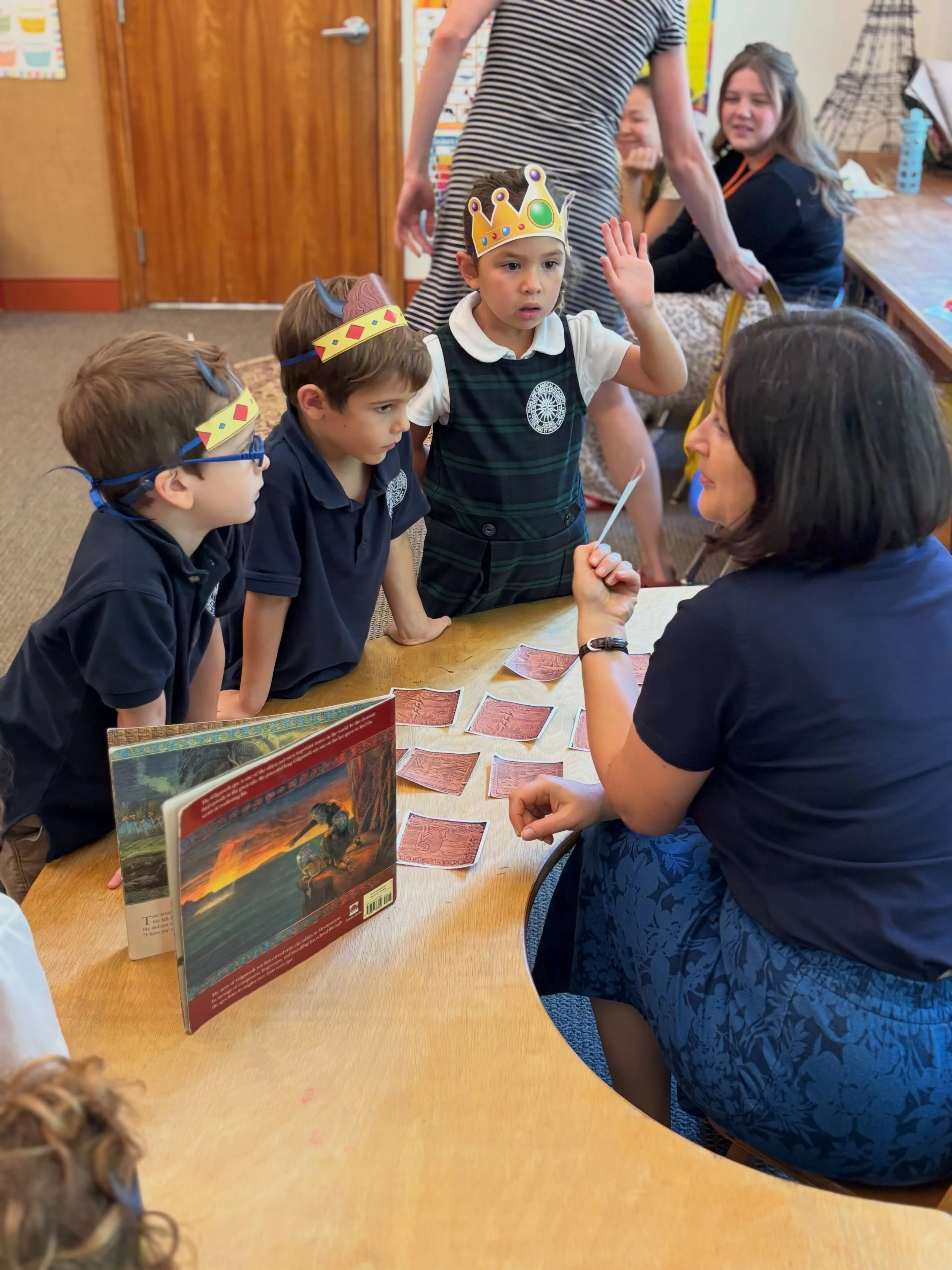 Great stories invite children to remember, wonder, and share what they know.

Our kindergarten students celebrated the conclusion of the Gilgamesh trilogy with a book party. Working in pairs as Gilgamesh and Enkidu, they sorted mixed-up story &ldquo;