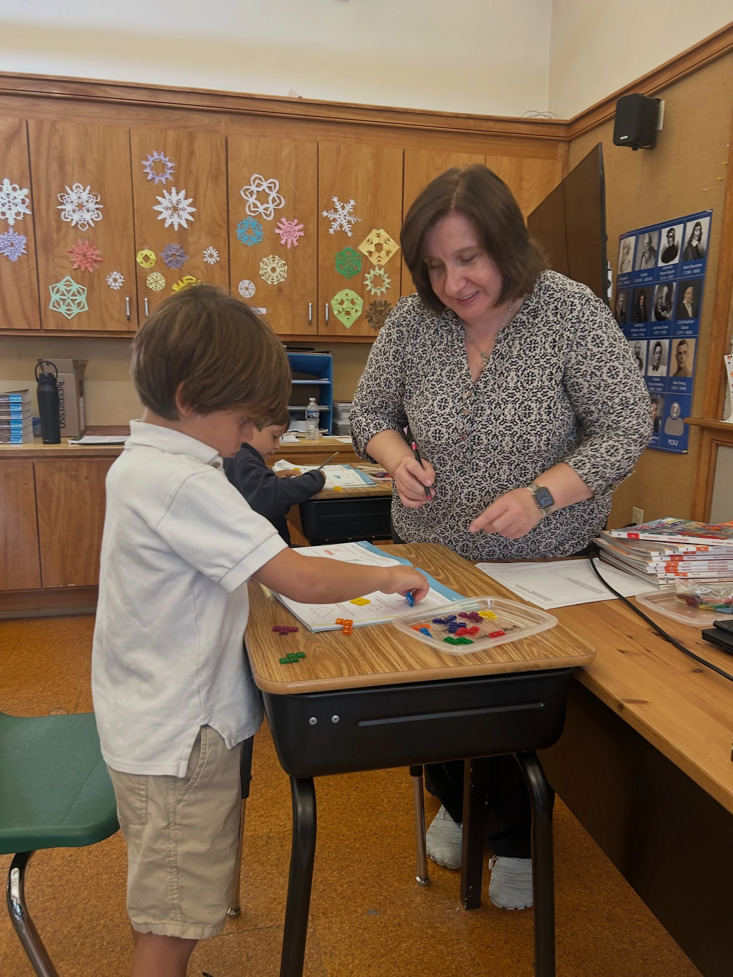 Even a small shape can hold an interesting mathematical question.

In first grade, our students explore how shapes fit together, turning and rearranging colorful pieces to discover different solutions. Their Beast Academy workbooks, from Art of Probl