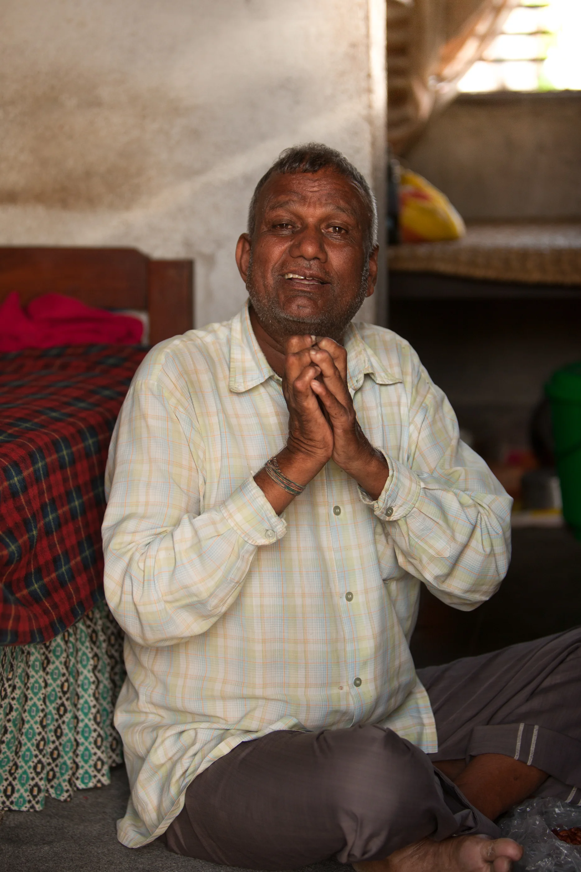 Krishna is long time resident of Khokana. He is a devoted father, husband and devout Hindu.