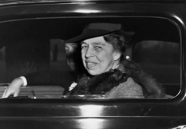 Eleanor-Roosevelt-smiles-out-at-photographers-from-a-White-House-limousine.-FDRL1.jpg