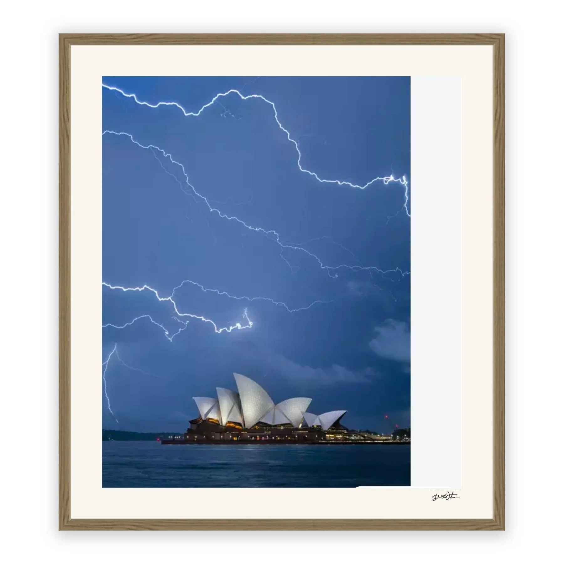 Under Charge – limited edition fine art photographic print by Dani Watson in a raw oak frame