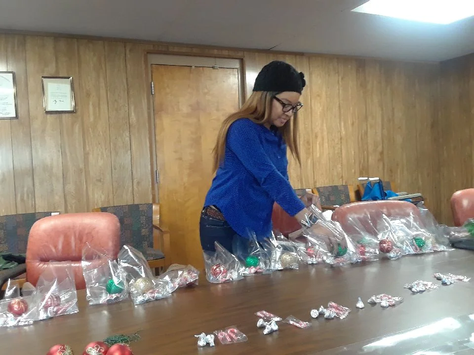 First Lady Portsha Franklin-Gordon assembling treats for the St. John Missionary Baptist Church Ministry at the Italian Home in Jamaica Plain