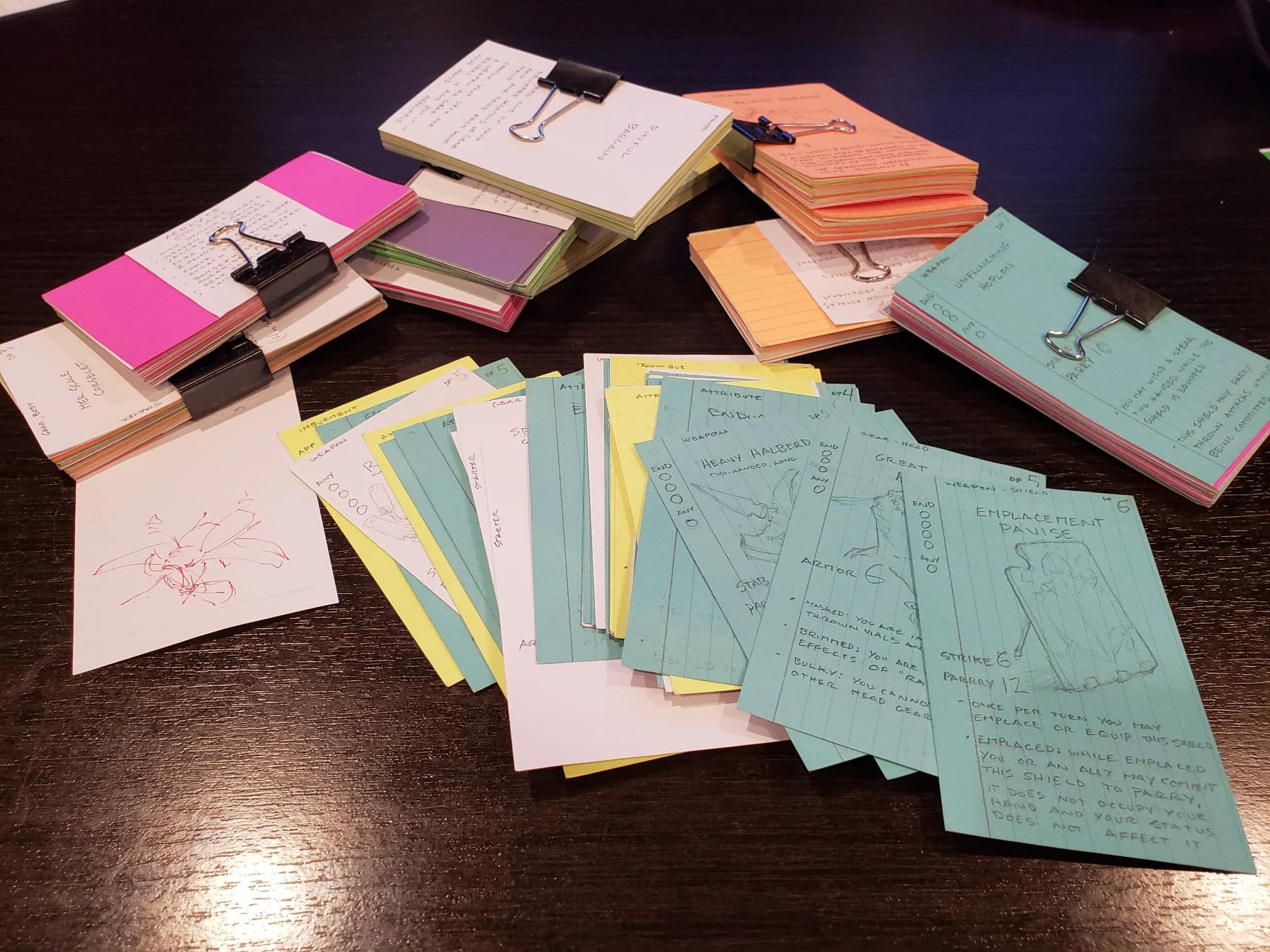 Twelve tested decks of prototype cards