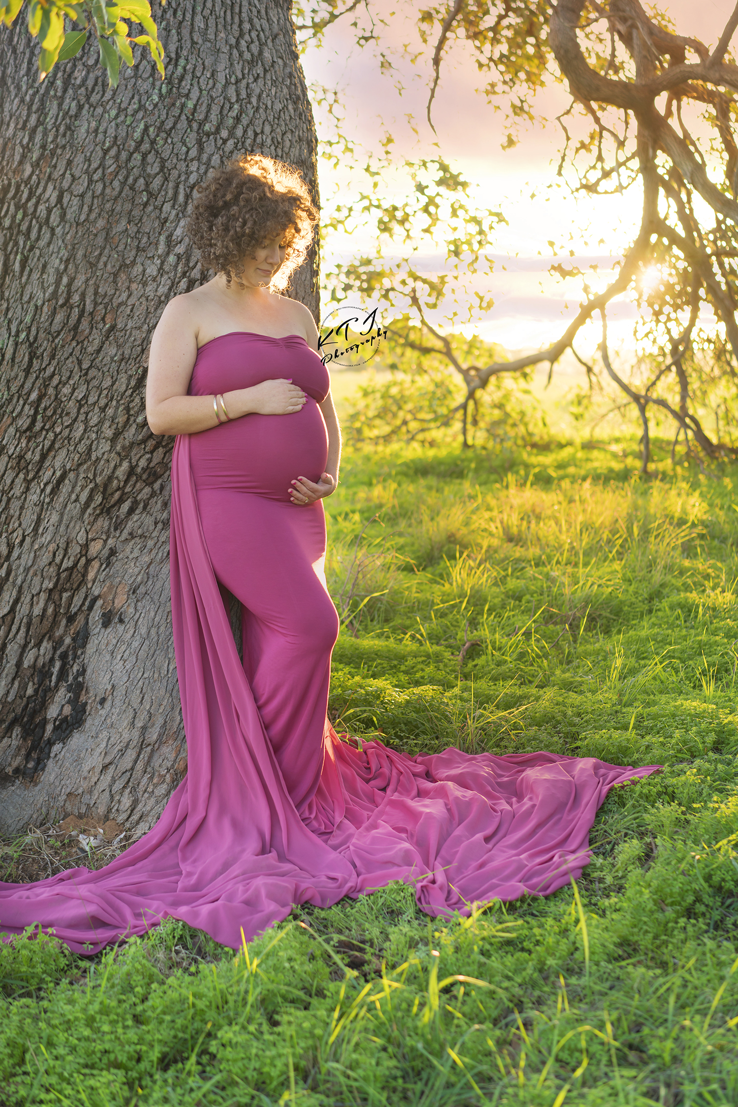 Maternity client at Perth Park in pink dress