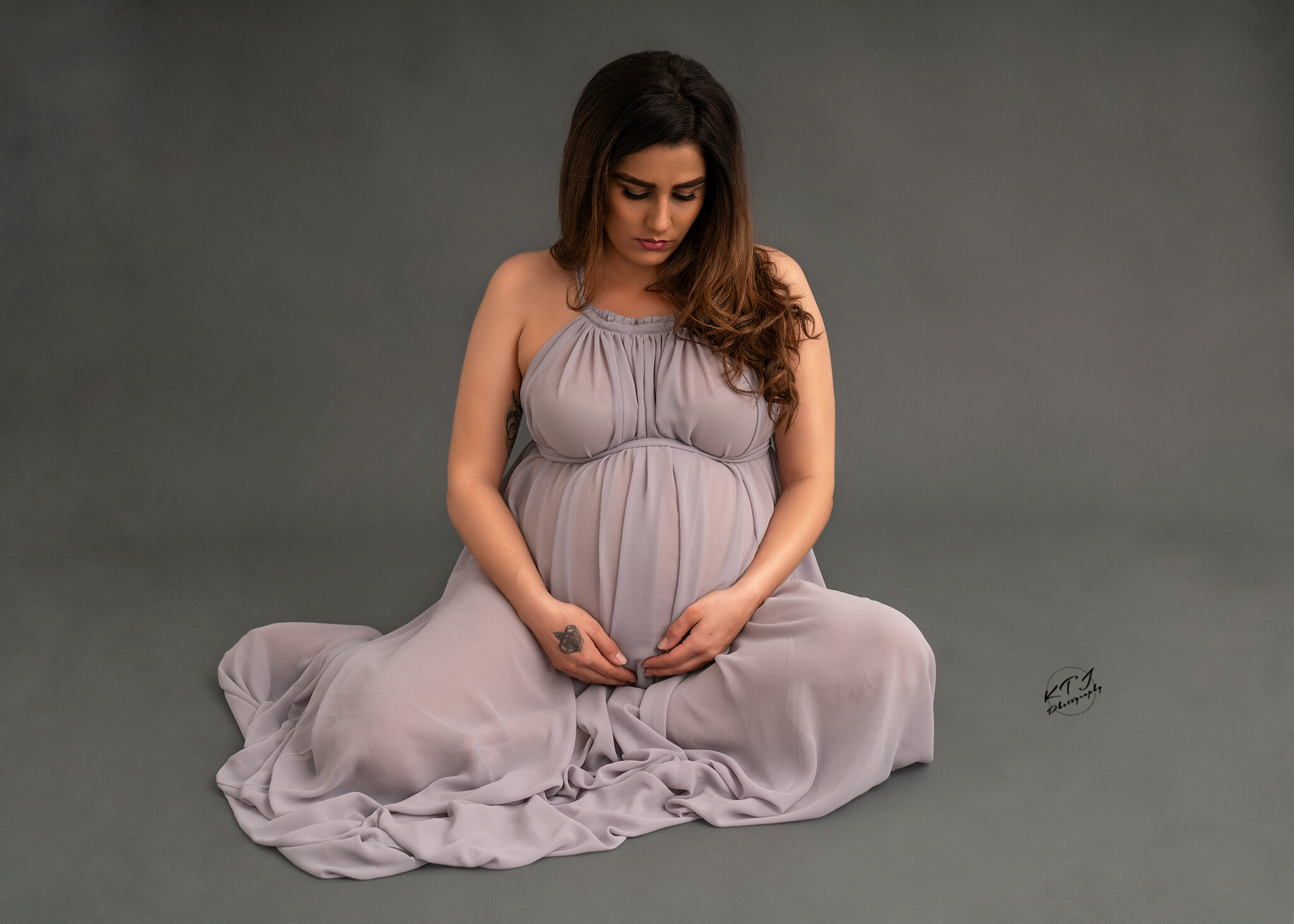 Maternity Client in gown in studio photoshoot