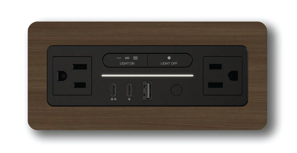 Wood grain decor trim for Nonstop Terminal 1 hotel guestroom power and lighting outlet