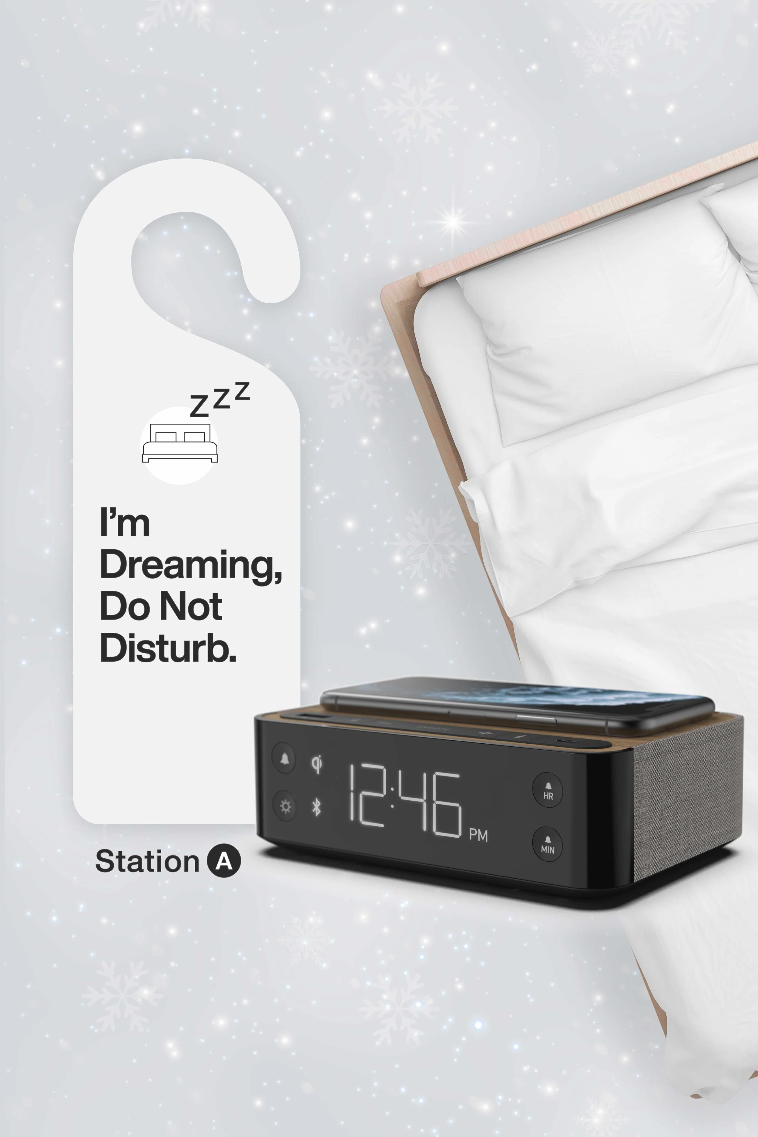 Station A hotel bedside charging clock with Qi wireless charging, USB-C and USB-A ports, built-in speaker, relaxation sounds, and a hotel-ready alarm, shown beside a modern bed.