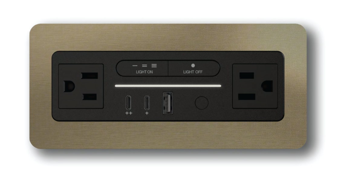 Brushed metallic decor trim for Nonstop Terminal 1 hotel power and USB-C charging outlet