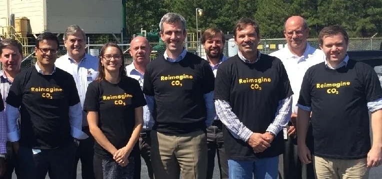 Members of Team CarbonCure meet at the National Carbon Capture Center in Wilsonville, Alabama. From left: Kevin Cail, Abdul-Aziz Rashad, John Kline, Jennifer Wagner, Ryan Norton, Robert Niven, Patrick Norton, Richard Esposito, Frank Morton and Kyler Stitt.