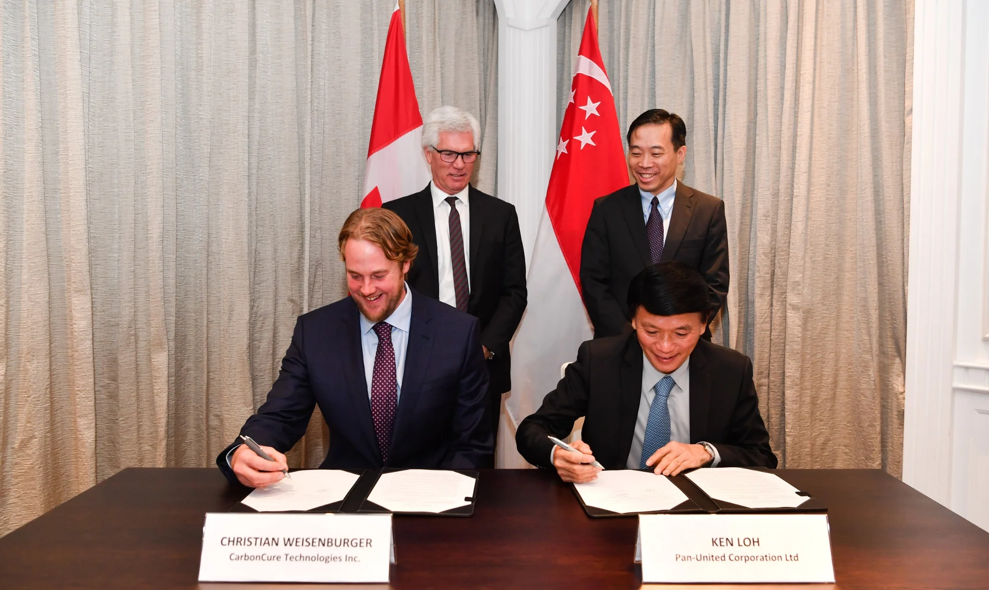 The Strategic Partnership Agreement signing ceremony took place on November 15, 2018 in Singapore between Pan-United and CarbonCure. It was jointly witnessed by the Honourable James Gordon Carr, Canada’s Minister of International Trade Diversification, and Mr Png Cheong Boon, Chief Executive Officer of Enterprise Singapore, the Singapore government agency championing enterprise development. CarbonCure Founder and Chief Executive Officer, Mr Robert Niven, was represented by Mr Christian Weisenburger, CarbonCure General Counsel. The Pan-United signatory was its Executive Director, Mr Ken Loh.