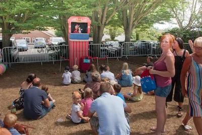 Children enjoying the Punch and Judy show