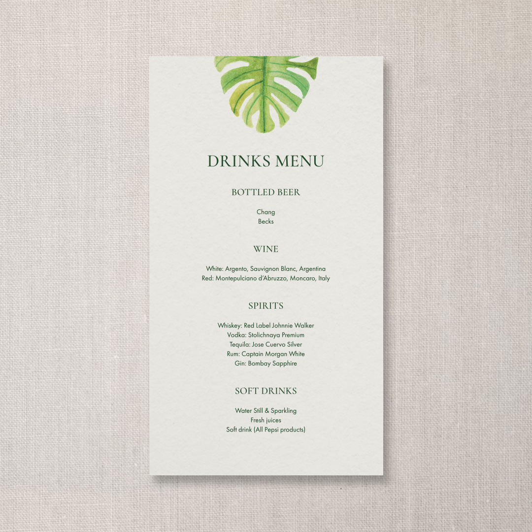 A drinks menu with a green tropical leaf illustration at the top.