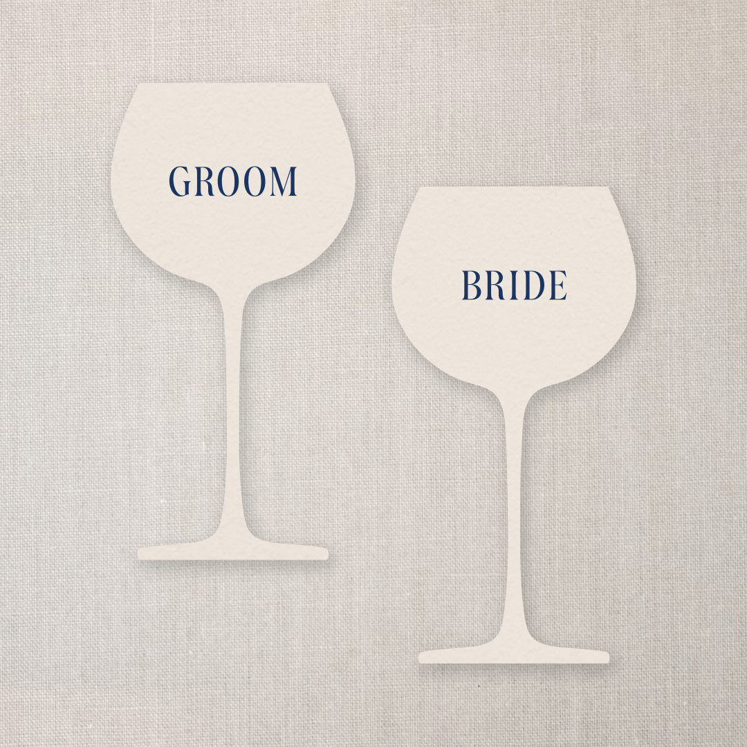 Illustration of two wine glasses labeled 'GROOM' and 'BRIDE' on a textured beige background.