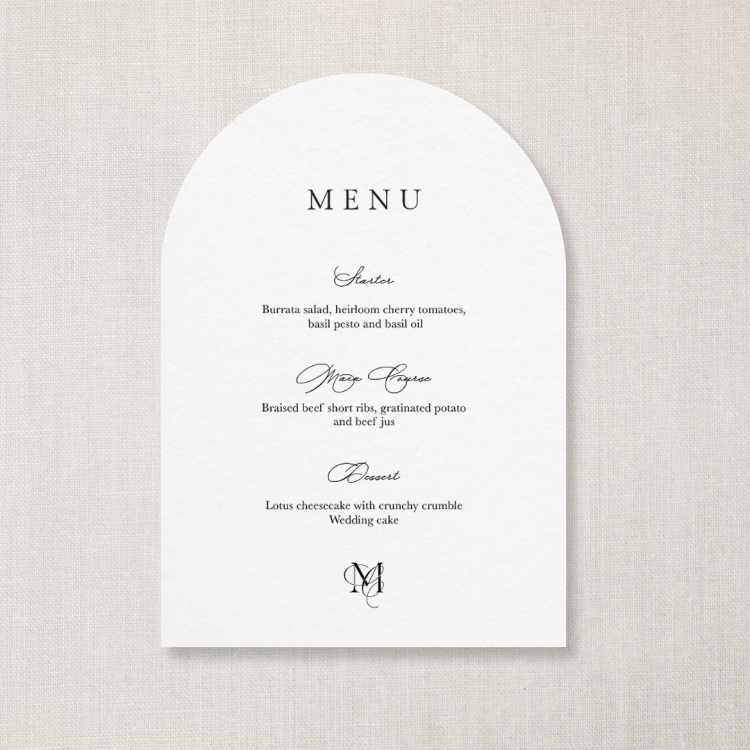 Elegant wedding menu card with a rounded top, featuring a three-course meal including starter, main course, and dessert, with a monogram at the bottom.
