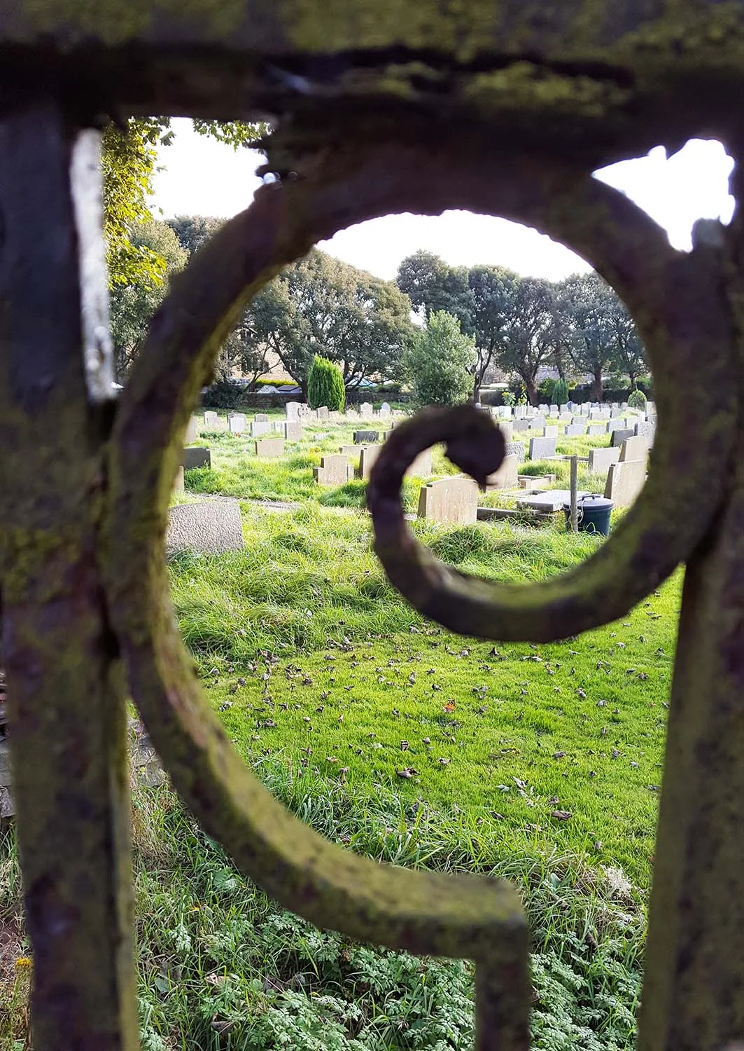 View through the gate to the graveyard where Sylvia Plath is buried